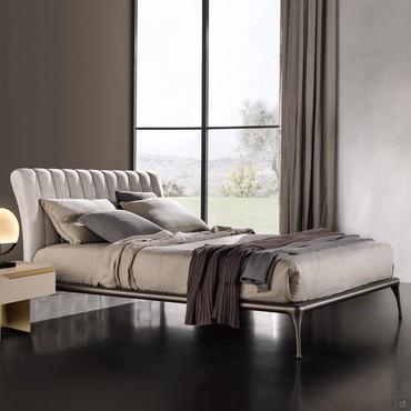 Iseo bed with vertical quilted headboard by Cantori