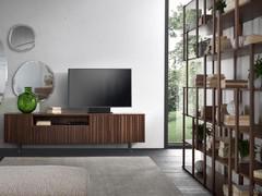 Modular bookcase Caravel in a living room featuring the colors of Canaletto walnut