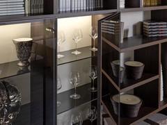 Detail of display cabinets with transparent grey framed glass doors