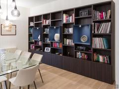 Aliant 05 modular bookcase with doors and frame in brown oak melamine and open lacquered compartments with LED spotlight - customer photo