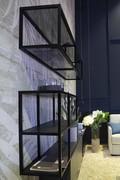 Side view of bookcase elements with glass and melamine shelves