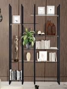 Milton bookcase with 4 wall uprights, with fully customizable shelf widths to also create asymmetrical compositions