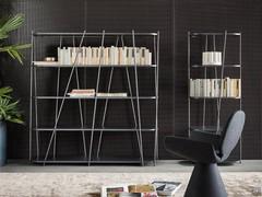 Minimal and modern column bookcase Twigs by Bonaldo resting on the wall