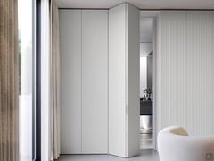 Access to the master bedroom bathroom with a Lounge linear walk-in closet. Note on the doors the 10:10 machining