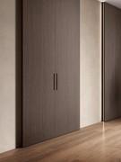 Lounge wall-mounted sliding door: note the pair of groove handles veneered to match the doors