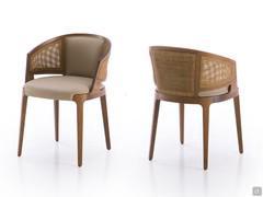 Velis chair made of walnut-stained ash and full-grain Lord leather in the lounge version with Vienna straw backrest