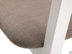 Detail of upholstered seat covered in practical stain-resistant fabric