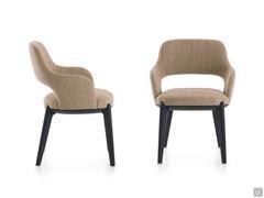 Front and side view of the Turner chair, with backrest and armrests fused into a single ergonomically shaped structure