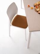 Stackable kitchen chair Jana made of colored polypropylene and upholstered seat covered in fabric