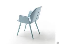 Rear view of the chair Cloe in the version with armrests