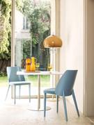 Chairs Nadine ideal for a modern dining area, offered here in a monochrome light blue version