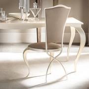 Ghirigori chair with sabre-shaped legs and upholstered seat-back