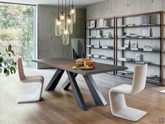 Venere s-shaped upholstered chair by Bonaldo, paired with Big Table from the same collection