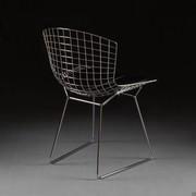 Wire Chair created by Harry Bertoia and made with welded chromed rods.