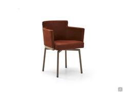 Evora chair with upholstered seat resting on a swivel base