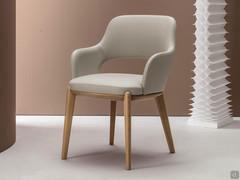 Turner upholstered chair with oak wood legs covered in leather with brushed oak wood legs in finish Fashion Wood 014 Natural