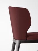 Detail of the shaped, fabric-covered backrest of the Joy chair by Bonaldo