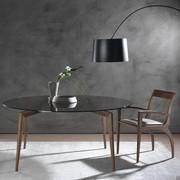 Tilda curved design wooden chair in combination with a top glass dining table