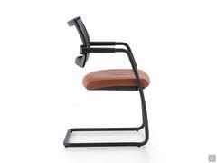 Side view of office chair with black painted metal frame