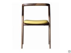 Nakama chair has a wrap-around backrest