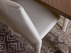 Detail of the seat and high back of the Corinne chair, here proposed with leather upholstery Lord