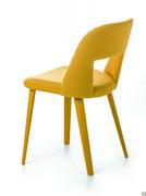 Chair Vence with seat covered in fabric matching with the RAL lacquered finished legs