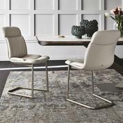 Kelly Cantilever upholstered cantilever chair, with base in embossed metal and upholstery in leather