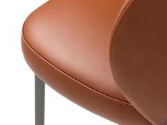 Details of the stitching on the seat and back of the Rakel upholstered chair