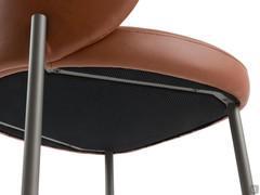 Detail of frame and seat of the Rakel chair, with thin lacquered metal legs