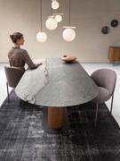 Living room with Rakel chairs covered in fabric and matched with Savannah table