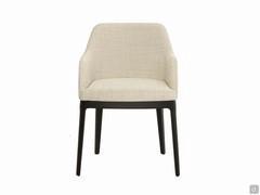 Front view of the Cleo armchair in the low-back version, upholstered in Bouclé fabric