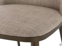 Detail of the fixed cushion seating upholstered in Barren col.07 which is a natural water-repellent fabric 