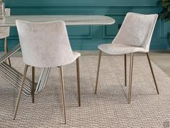 The Agata chair with lacquered metal legs in stone bronze finish 