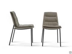 The modern Dama upholstered seat in leather - with 4 metal legs