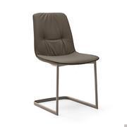 Betta elegant chair with faux-leather piping. Leather cover and cantilever base in Titanium painted metal.