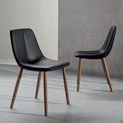 Upholstered chair with wooden legs By by Bonaldo