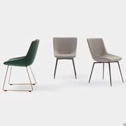 Enveloping upholstered chair also available with a sled base version