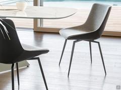 Upholstered chair with slim legs Artika by Bonaldo, also with two-tone upholstery that mixes fabric and leather