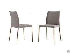 Rosa upholstered chairs with smooth backrest. Metal legs and body upholstered in Nabuk leather.