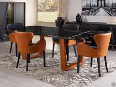 Brixia dining chairs combined with B130 table with matching upholstered legs