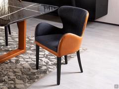 Brixia dining chair in Tuscania 20 leather and St. Moritz 162 fabric