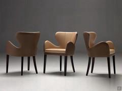 Brixia leather dining chair with armrests in two-tone version