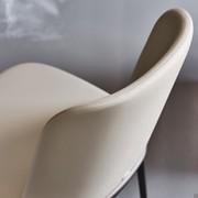 Close-up of the smooth back on the Magda chair by Cattelan