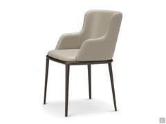 Magda chair with armrests and quilted back. Legs in embossed metal.