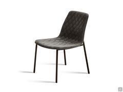 Will diamond-quilted upholstered chair, without armrests. Upholstery in Nubuck leather and black painted-metal legs.