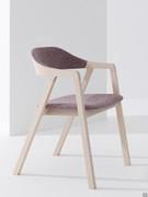 Bryanna chair with a Scandinavian design made from stained or lacquered ash wood with 4 legs and a trestle structure