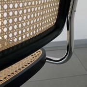 Close up of the Cesca B32 Chair by Marcel Breuer - seat with black lacquered beechwood edge and rattan seat 