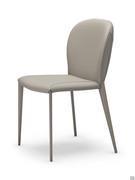 Nancy by Cattelan, an upholstered chair with steel legs ideal for modern, elegant living rooms and dining rooms 