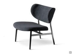 Chair Noor by Bonaldo in the armchair version, with low seat and wraparound backrest