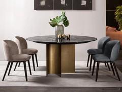 Chairs Shiba paired with the Mirage table for a sophisticated living room with precious finishes